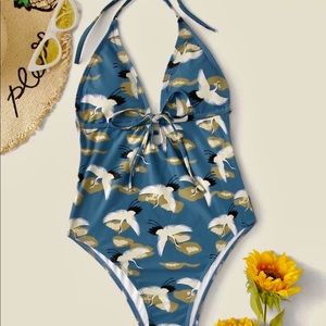 Backless, plunging swimsuit